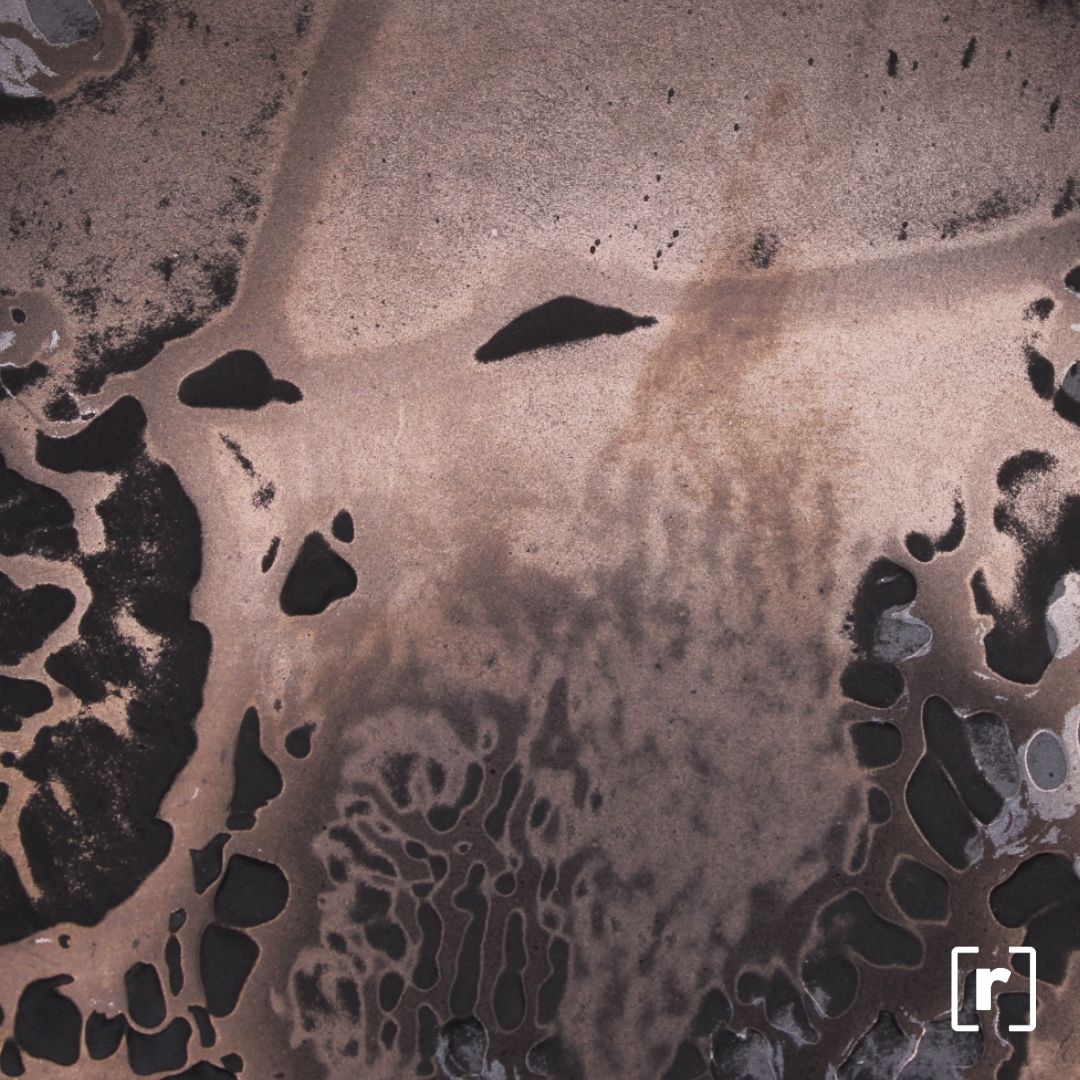 Manganese with Erosion Finish creating a pitted texture